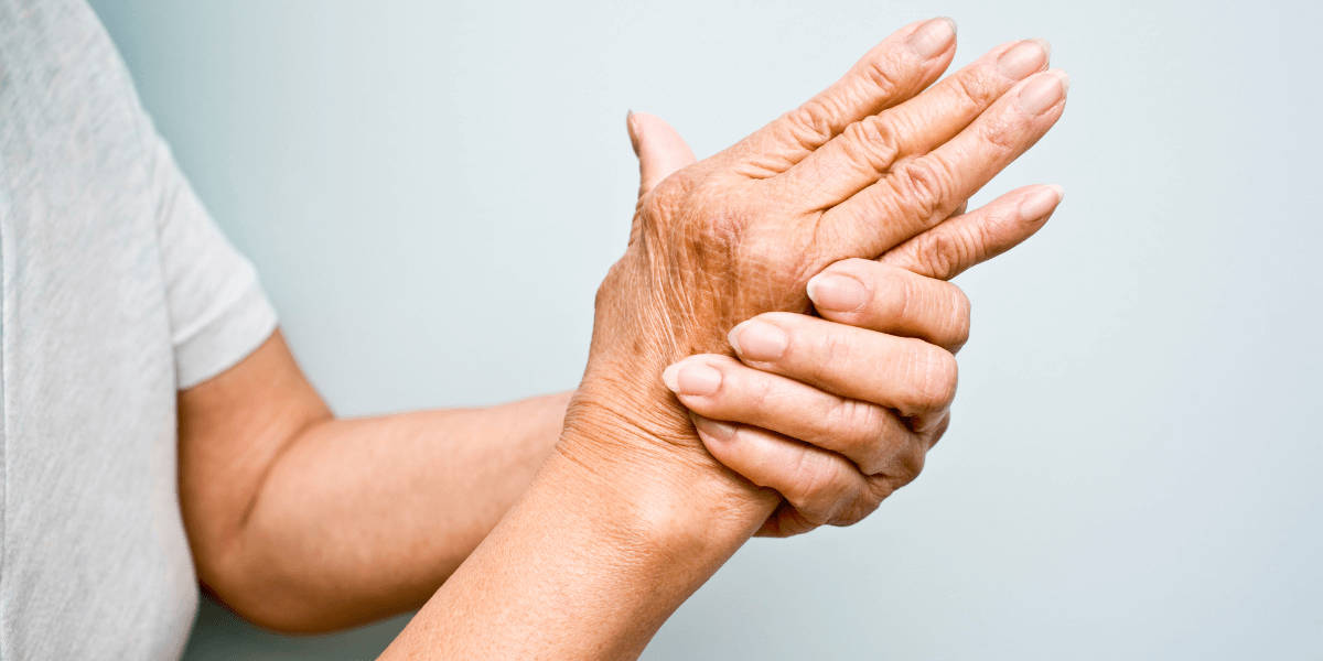 A patients handing hurting with Psoriatic Arthritis 